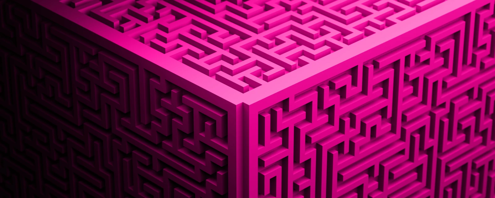 UX Design Content Bild - Nahaufnahme pinkfarbener Würfel mit Labyrinth-Relief als Oberfläche